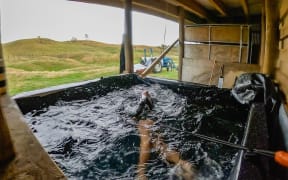 New Zealand triathlete Nicole van der Kaay's father built her a make shift pool in his farming shed so she could continue training during the level 4 lockdown.