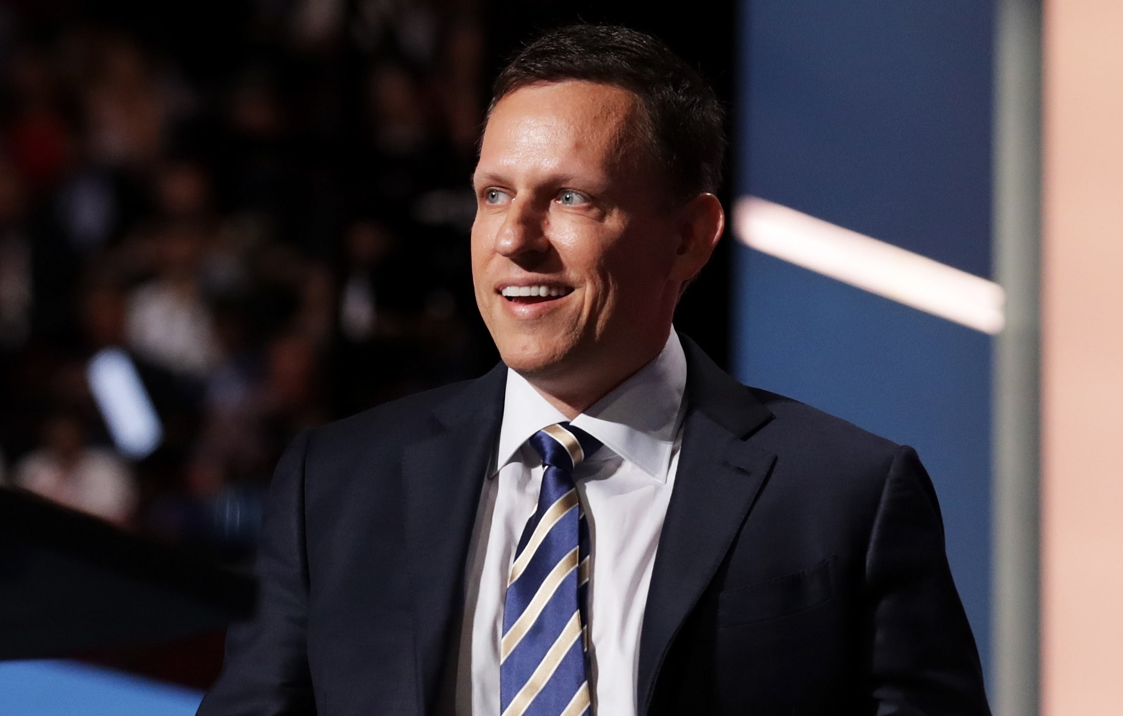 Peter Thiel, co-founder of PayPal, walks on stage to deliver a speech during the evening session on the fourth day of the Republican National Convention on July 21, 2016 at the Quicken Loans Arena in Cleveland, Ohio.