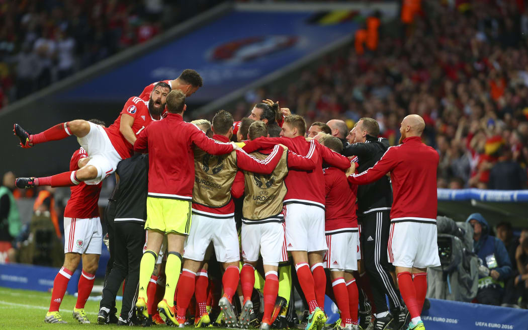 The Wales football team celebrate a goal against Belgium in their Euro 2016 quarter final.