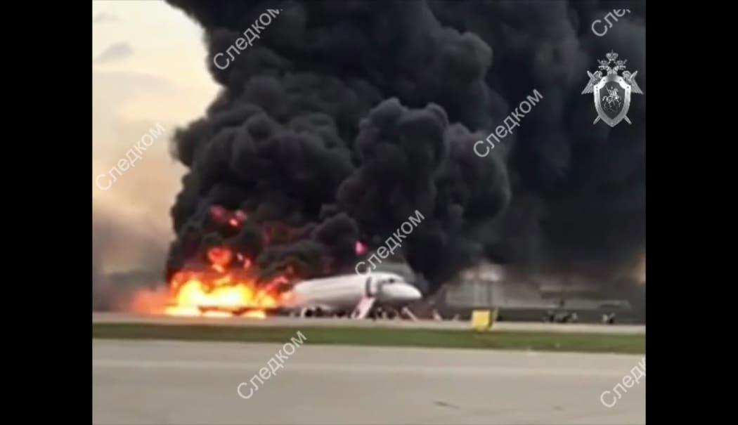 In this photo released by Russian Investigative Committee the Sukhoi Superjet 100 passenger plane of Russian Aeroflot Airlines is on fire at the Moscows Sheremetyevo International Airport, Russia.