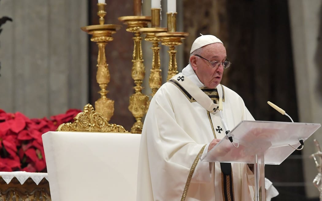 Pope Francis celebrates a mass on Christmas eve.