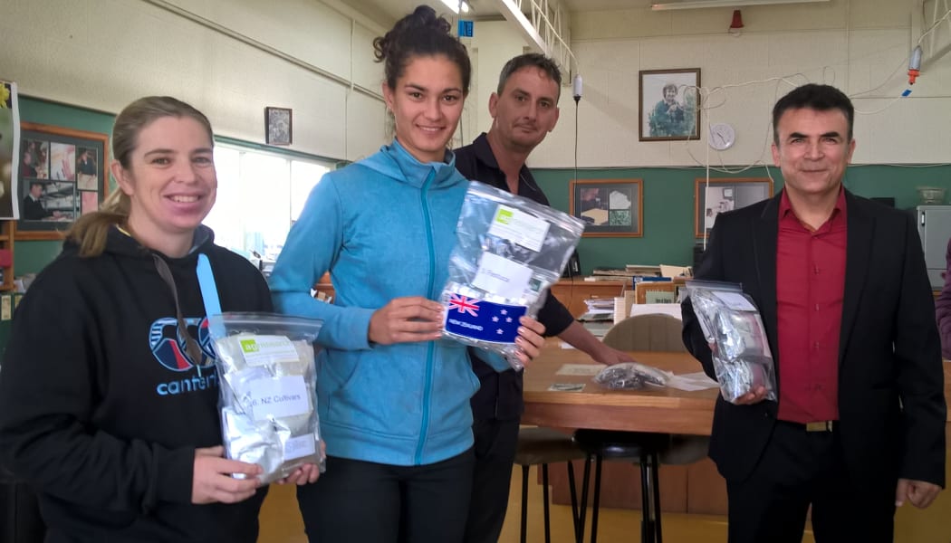The team at AgResearch’s Margot Forde Germplasm Centre with the seeds for Svalbard. L-R: Michelle Williamson, Vanessa Angster, Zane Webber and Dr Kioumars Ghamkhar.