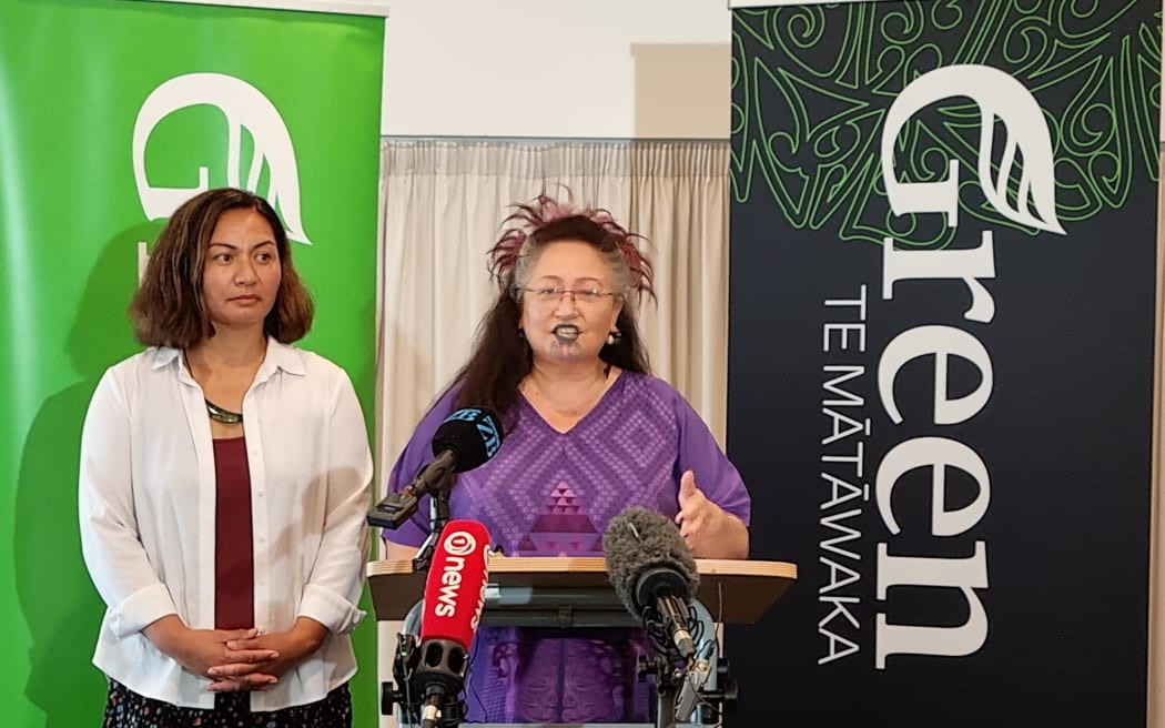 Green Party co-leader Marama Davidson (left) and Green MP Elizabeth Kerekere speaking at Waitangi on 4 February 2023.