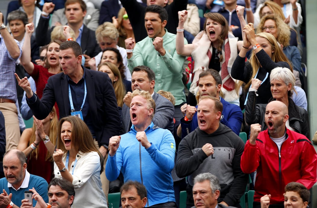 Andy Murray's players' box celebrates after he takes the first set during the 2016 French Open tennis championship.