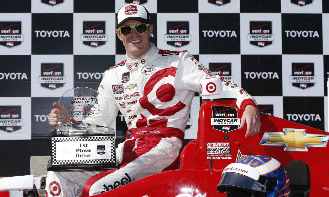 Scott Dixon with the spoils after winning the Indy Car Long Beach Grand Prix.