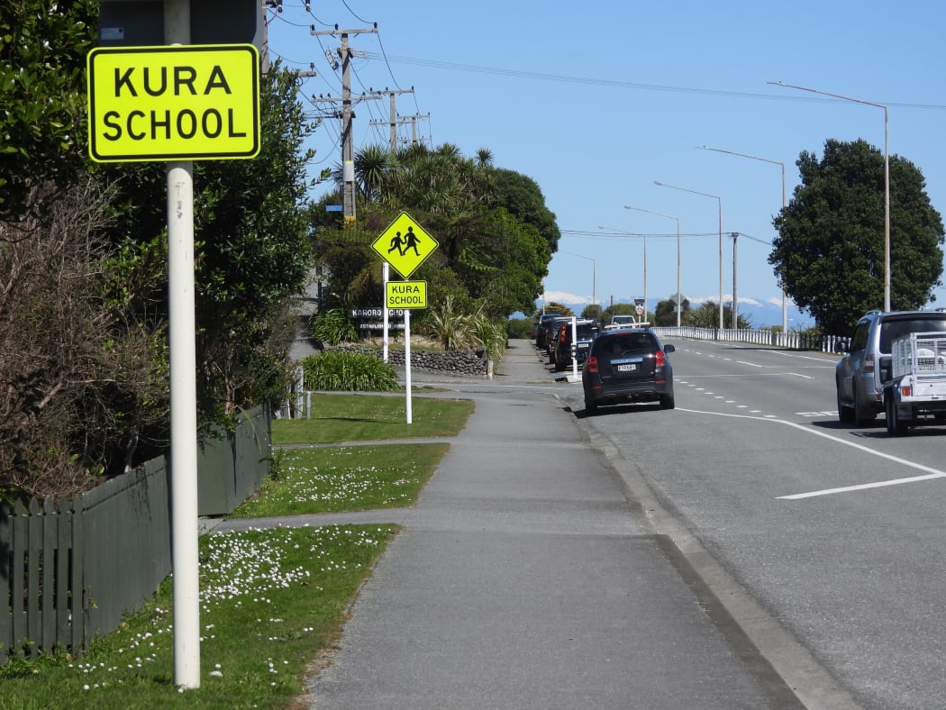 Bilingual signs spark ‘unfortunate’ race comments