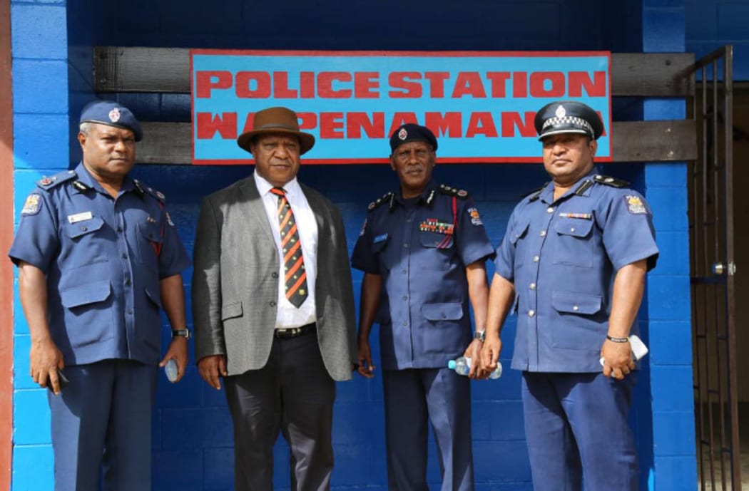 Assistant Commissioner of Police for Logistic Tony Duwang, Foreign Affairs Minister Rimbink Pato, Police Commissioner Gari Baki and Enga Provincial Police Commander  George Kakas in front of the new  Wapenamanda  police station (left to right). Picture by Police Media Unit.
