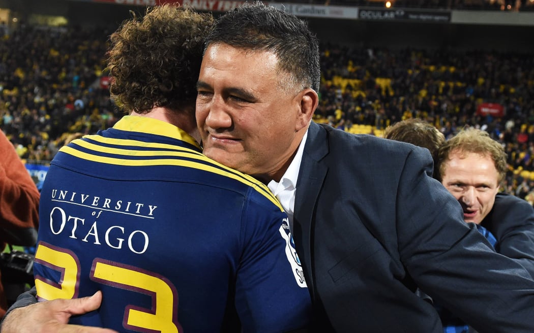 Jamie Joseph embraces Marty Banks after winning the Super Rugby title.