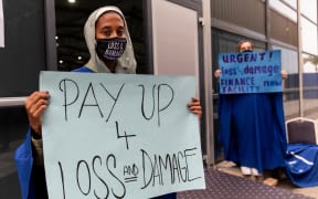 Women activists protest and demand Loss and Damage fund during the COP27 UN Climate Change Conference