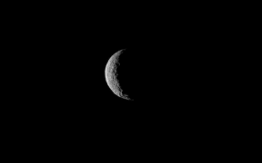 Ceres, taken by the Dawn spacecraft on March 1, just a few days before the mission achieved orbit around the previously unexplored world. The image shows Ceres as a crescent, mostly in shadow because the spacecraft's trajectory put it on a side of Ceres that faces away from the sun until mid-April.