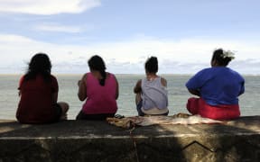 Samoan women gather on the waterfront in Apia.