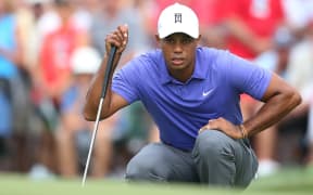 Tiger Woods "Journalistically and ethically, can you sink any lower?"