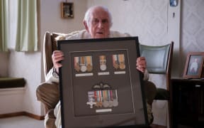 Ken Orman, who flew for the Royal Airforce in World War Two, and the medals he earned