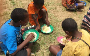 Food conditions for Papuan refugee children in Wamena.