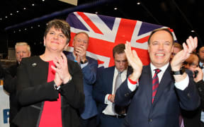 Democratic Unionist Party (DUP) deputy leader Nigel Dodds, at right,  and leader Arlene Foster. celebrate Dodds winning his Belfast North seat.