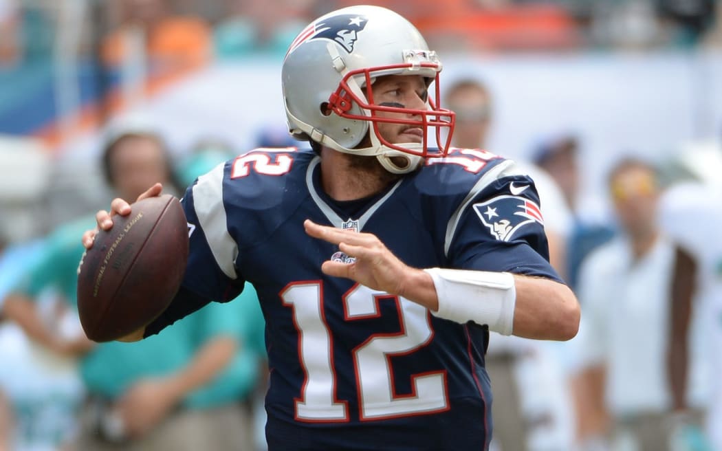 The Patriots' quarterback Tom Brady in action.