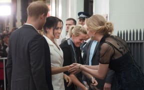 Prince Harry and Meghan arrive at Courtenay Creative to attend an event celebrating the citys creative arts scene in Wellington.