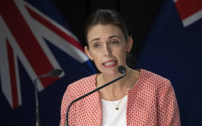 Prime Minister Jacinda Ardern during a briefing announcing the country will move to red traffic light settings at the Beehive on 23 January 2022.