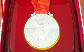 Samoan weightlifter Ele Opeloge's silver medal(Beijing 2008), her country's first ever Olympic Medal.