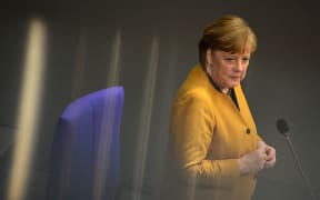 German Chancellor Angela Merkel speaks during question time at the Bundestag (lower house of parliament) in Berlin on 24 March 2021.