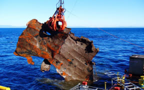 Work is continuing to retrieve container debris from the ocean.