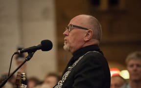 Dave Dobbyn performs at the Last Post Ceremony at the Menin Gate in Ieper, Belgium