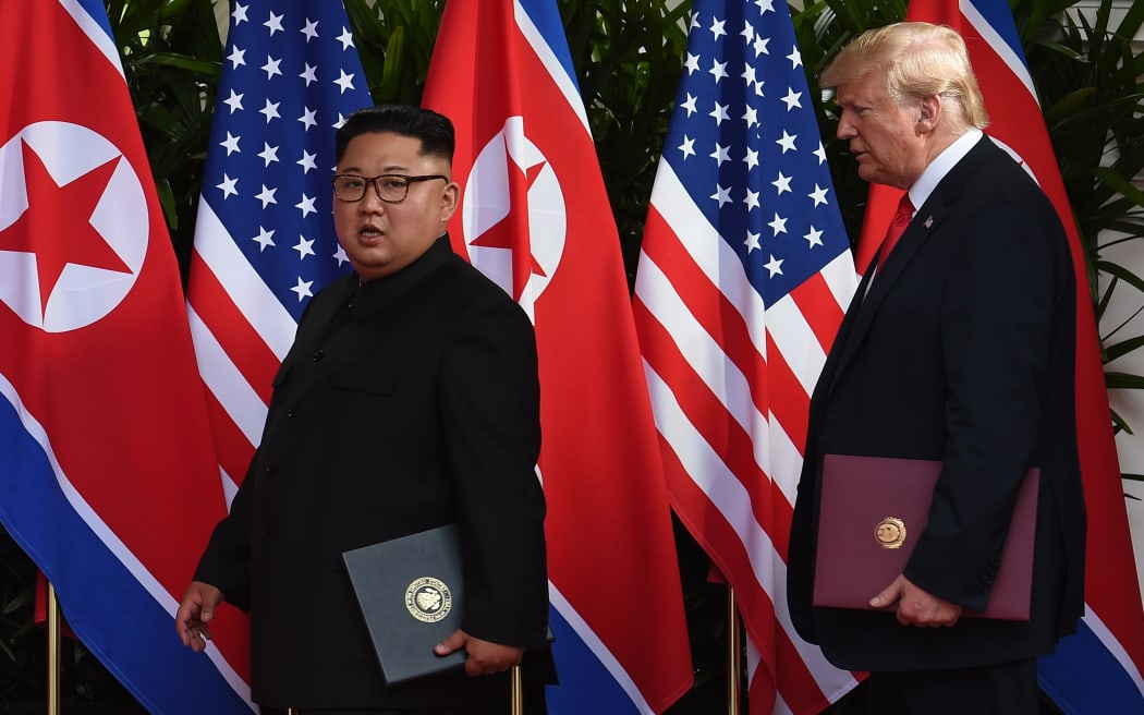 In June 2018, North Korea's leader Kim Jong Un and US President Donald Trump conclude their signing ceremony at the end of their historic US-North Korea summit in Singapore.