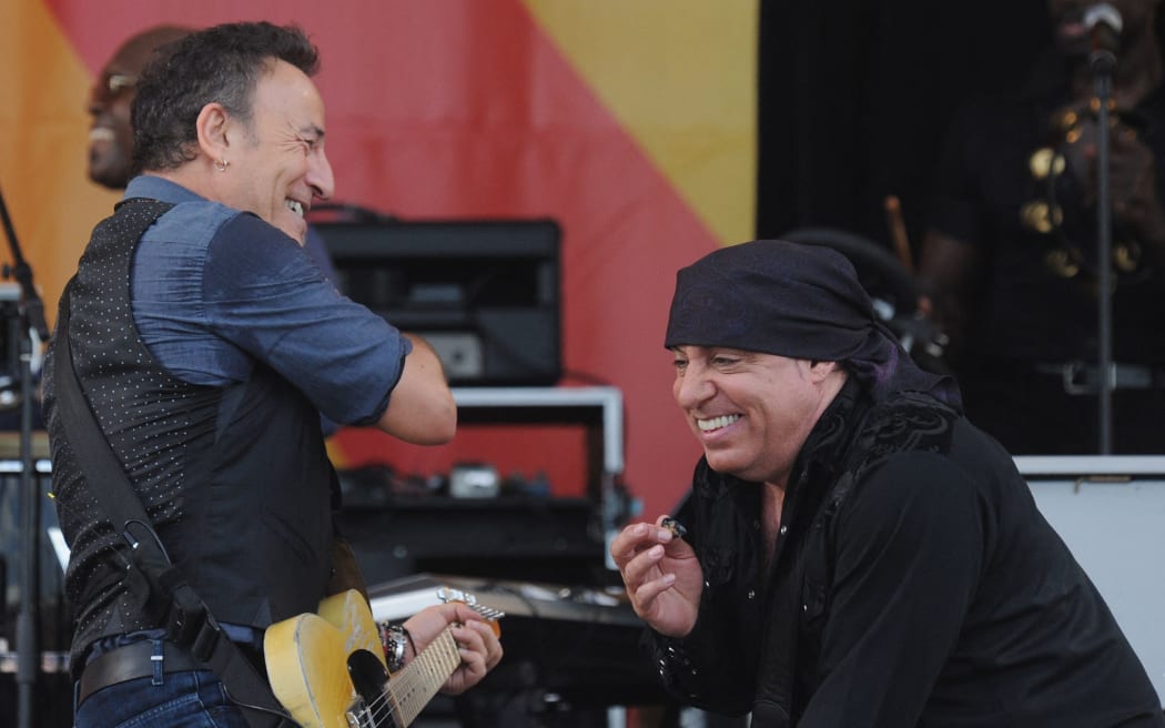 NEW ORLEANS, LA - APRIL 29: Bruce Springsteen and Steven Van Zandt of Bruce Springsteen and the E Street Band performs during the 2012 New Orleans Jazz & Heritage Festival in New Orleans, Louisiana.