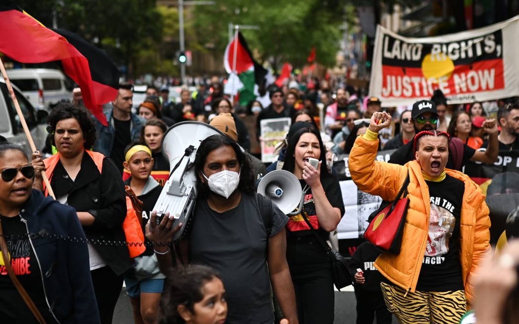 SYDNEY, AUSTRALIA - SEPTEMBER 22: Protesters participate in an Ã¢Abolish the Monarchy' protest on the national day of mourning for Queen Elizabeth II in Sydney, Australia, on September 22, 2022. Groups have gathered across Australia on the QueenÃ¢s National Day of Mourning to protest colonisation and demand the monarchy be abolished. (Photo by Steven Saphore/Anadolu Agency via Getty Images)