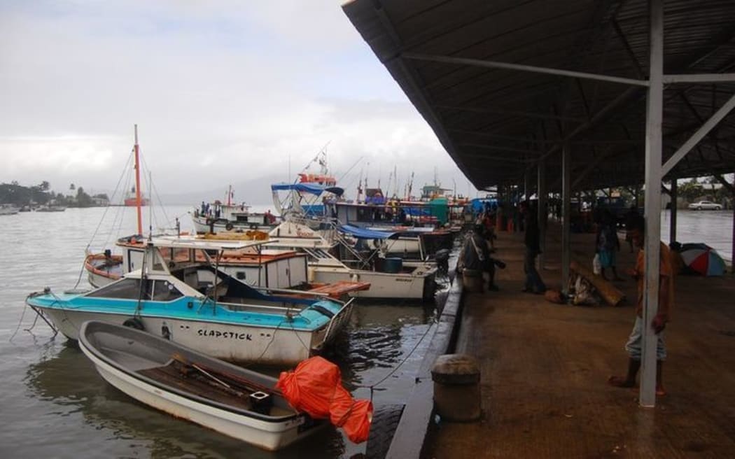 Boats at the port of Alotau in Milne Bay Province, Papua New Guinea, 2011.