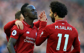 Sadio Mane celebrates his goal with Liverpool teammate Mohamed Salah
