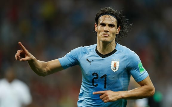 Uruguay's forward Edinson Cavani celebrates after giving his team the lead with his second goal during the Russia 2018 World Cup round of 16 football match between Uruguay and Portugal at the Fisht Stadium in Sochi on June 30, 2018. / AFP PHOTO / Odd ANDERSEN