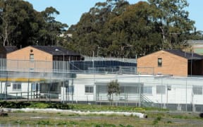 Steel fences surround Villawood Detention Centre in Sydney, which has been used to house refugees and those facing deportation (2010).
