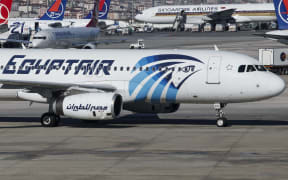 An EgyptAir plane is seen parked the terminal in Istanbul Airport Ataturk on May 20, 2016. Debris including seats and personal belongings from EgyptAir Flight 804 which crashed in the Mediterranean carrying 66 people on Thursday was found 180 miles north of Alexandria,