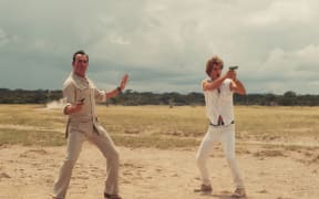 Jean Dujardin (OSS 117) and Pierre Niney (OSS 1001) defend themselves in their own unique ways in OSS 117: From Africa with Love.