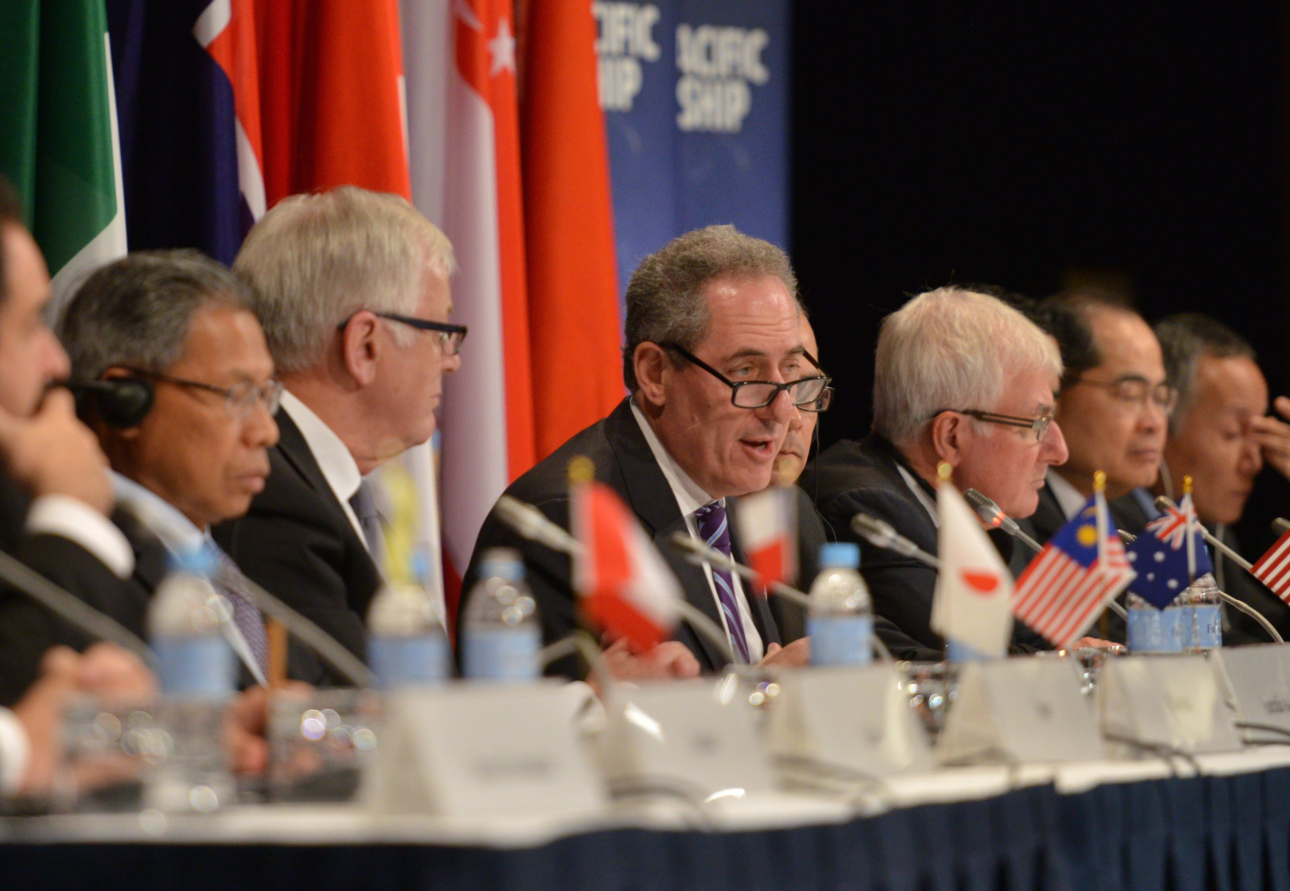 US Trade Representative Mike Froman (C) speaks at a press conference for the Trans-Pacific Partnership (TPP), in Sydney last year.
