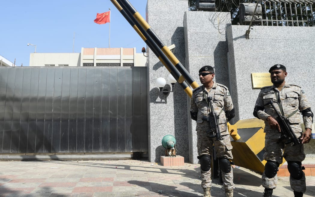 Pakistani rangers stand in front of the Chinese consulate after an attack in Karachi on November 23, 2018.