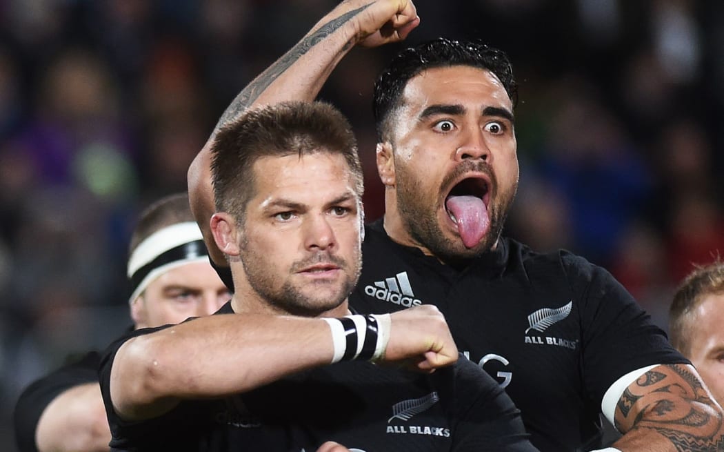 Richie McCaw and Liam Messam perform the Haka for the All Blacks.
