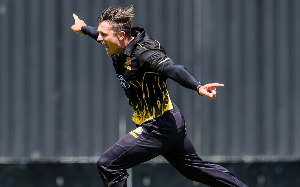 Wellington Firebirds skipper Hamish Bennett celebrates the wicket of Otago's Anaru Kitchen during the Ford Trophy one-day final.