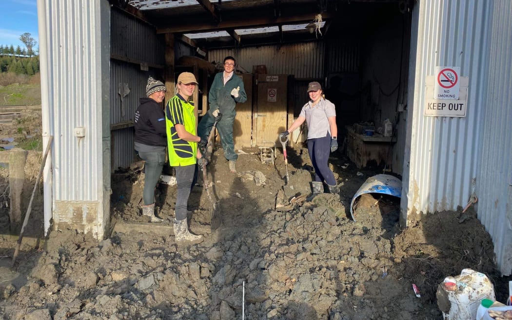 Handy Landy volunteers from Lincoln University cleaning out a shed at Rissington Cattle Company.