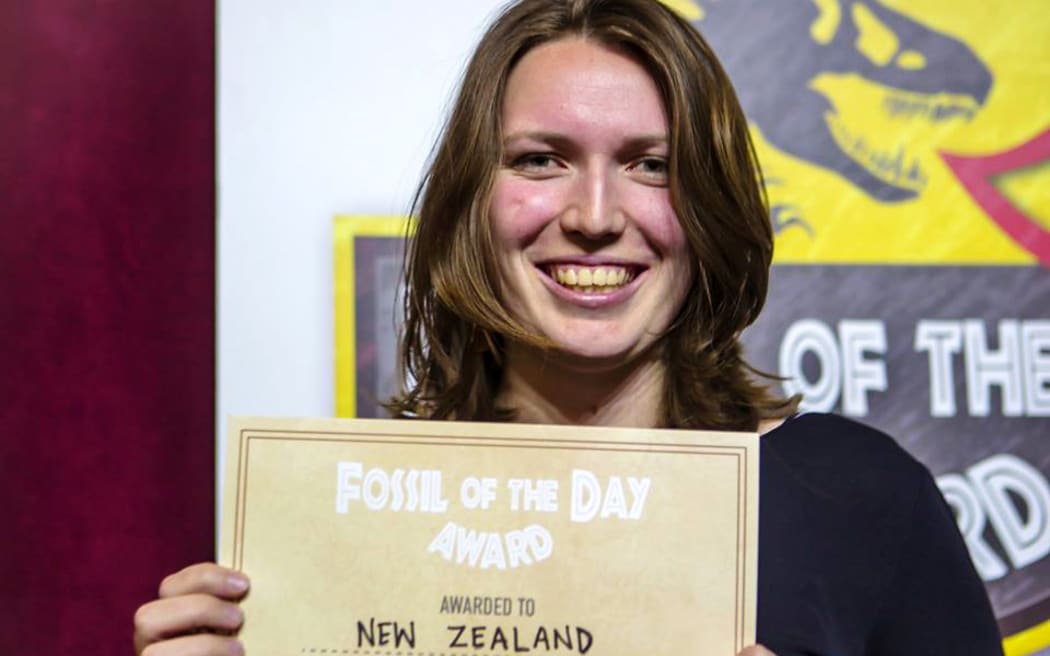Zoe Lenzie-Smith receiving Fossil of the Day award for NZ .