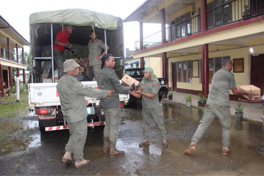 Food been delivered to an evacuation centre in Fiji.