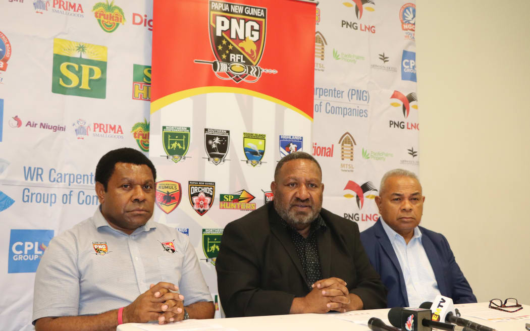 PNG Competition Manager Stanley Hondina, PNGRFL Chair Sandis Tsaka and PNGRFL CEO Reatau Rau.