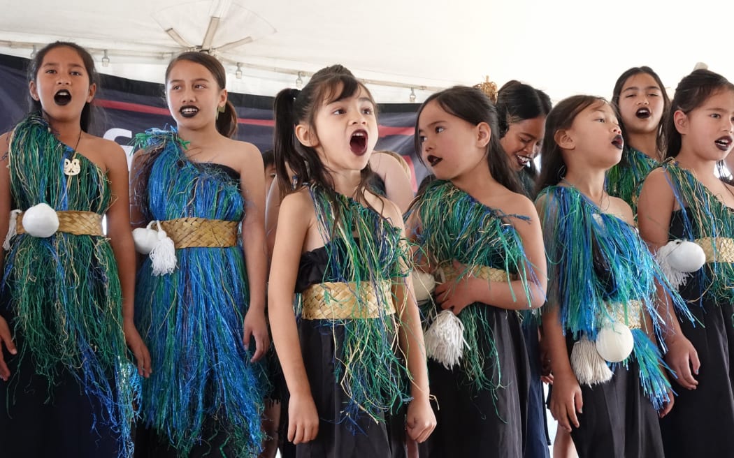Students of Te Kura Kaupapa Māori o Whangaroa, near Matauri Bay, perform a waiata.