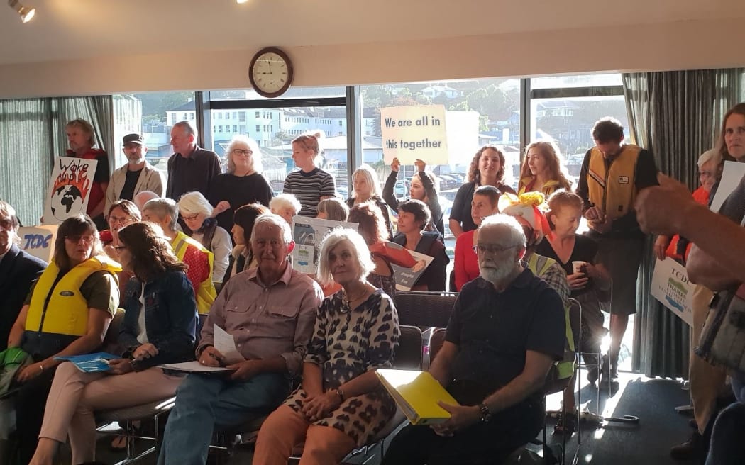 Protesters at the public forum after the Thames Coromandel District Council voted against signing a nationwide climate change declaration.
