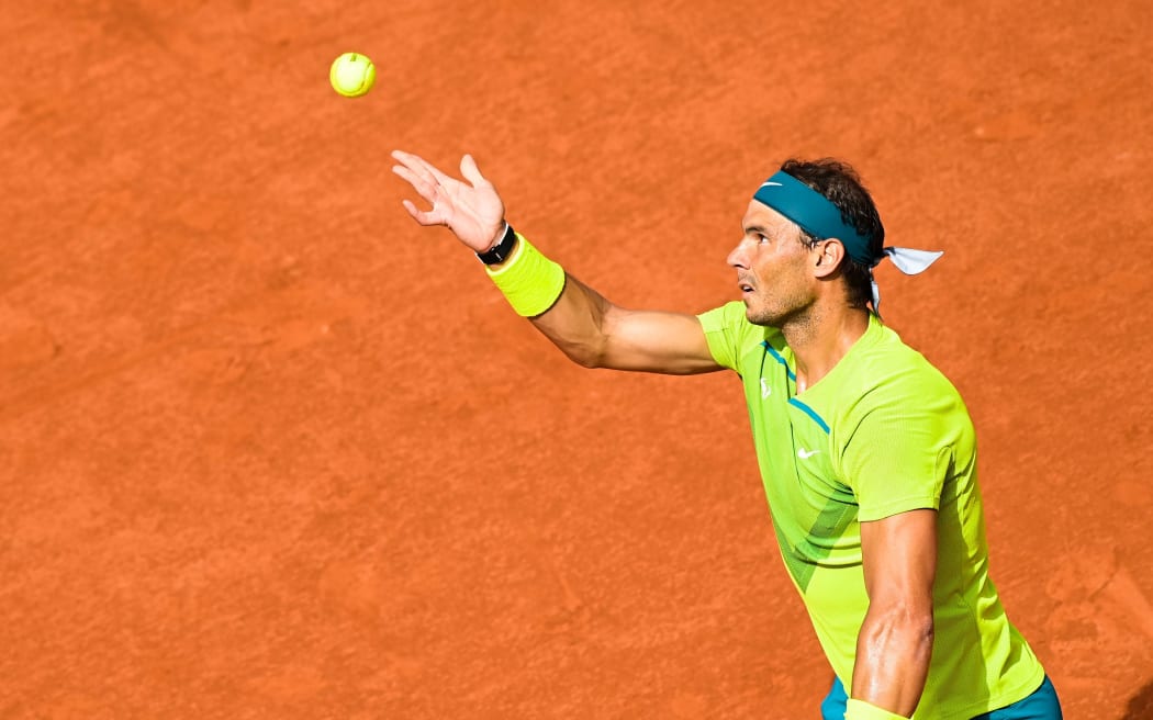 Nadal outlasts Djokovic in Paris