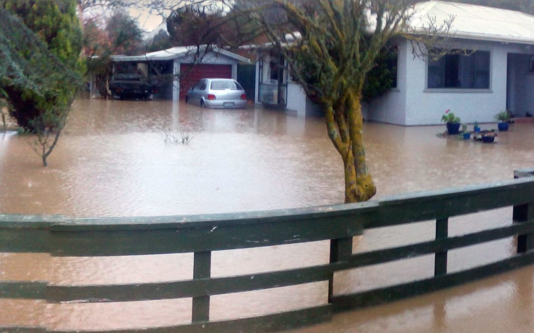 The Reweti whānau home during flooding in 2015.