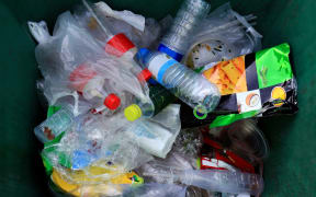 Garbage trash pile of waste plastic bag and bottle.
