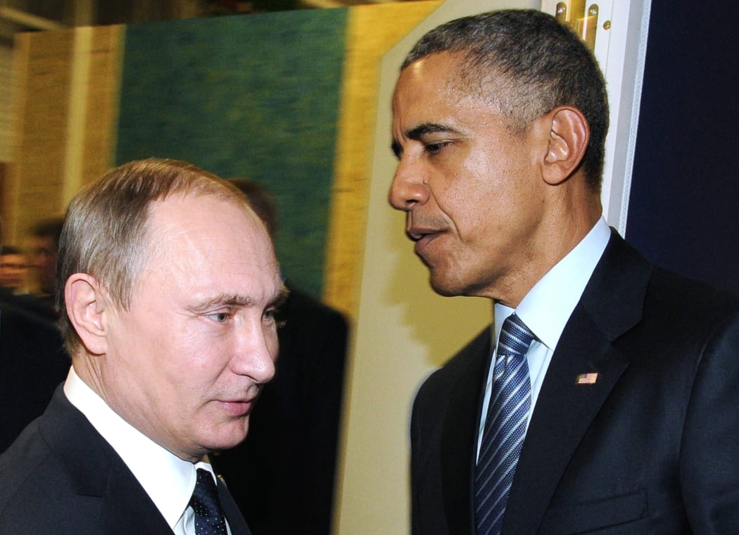 Russian President Vladimir Putin meets with US President Barack Obama