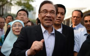 Anwar Ibrahim on his way into court.